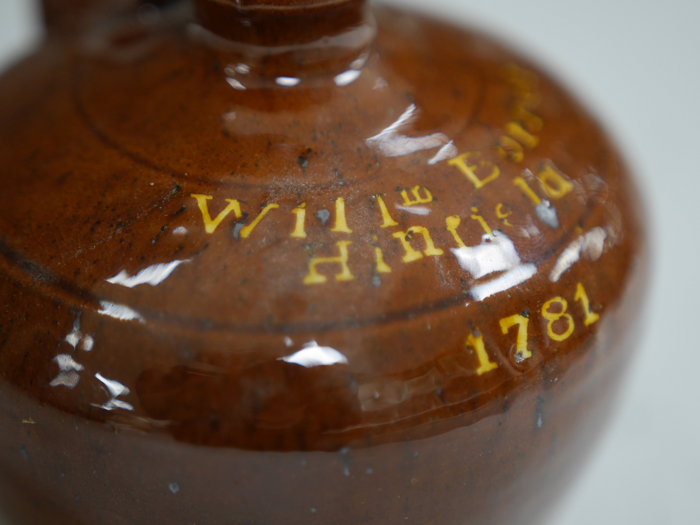 A Dicker Pottery flagon commemorating 'William Borrer, Hinfield, 1781', 13.5cm high. Condition - small glazing faults